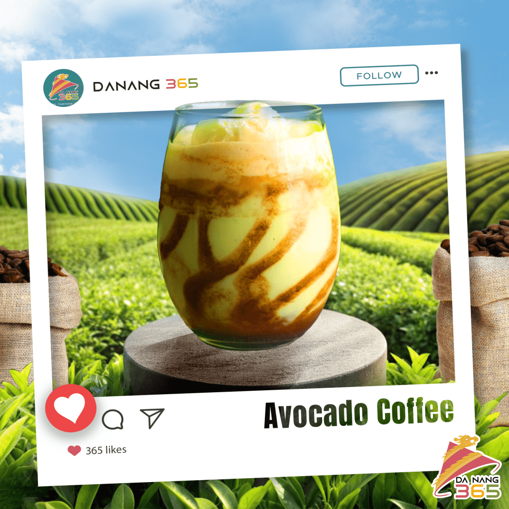 A refreshing image of Vietnamese avocado coffee set against lush green fields and a clear blue sky, beautifully framed for Da Nang 365 on Instagram.