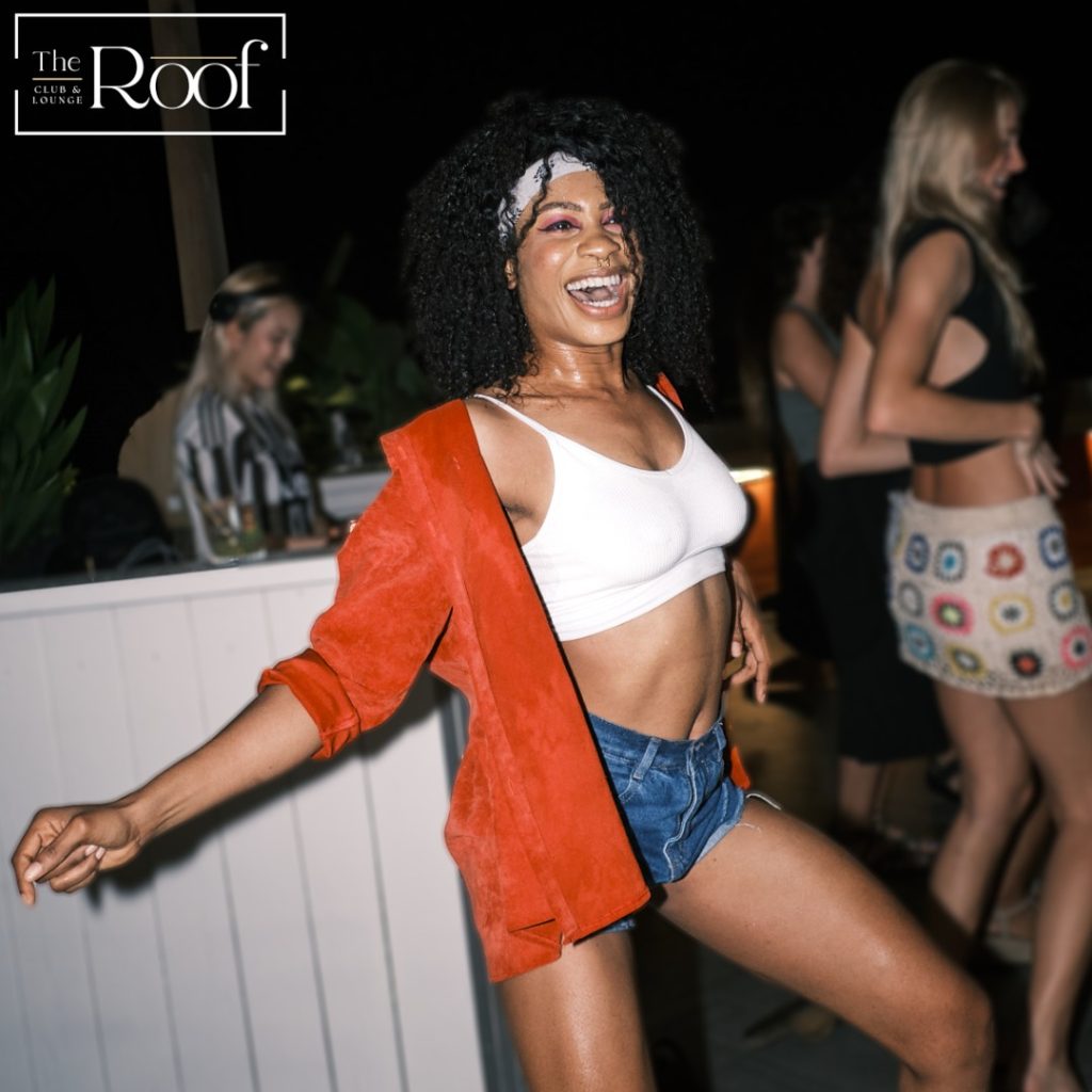 Customers enjoy at The Roof