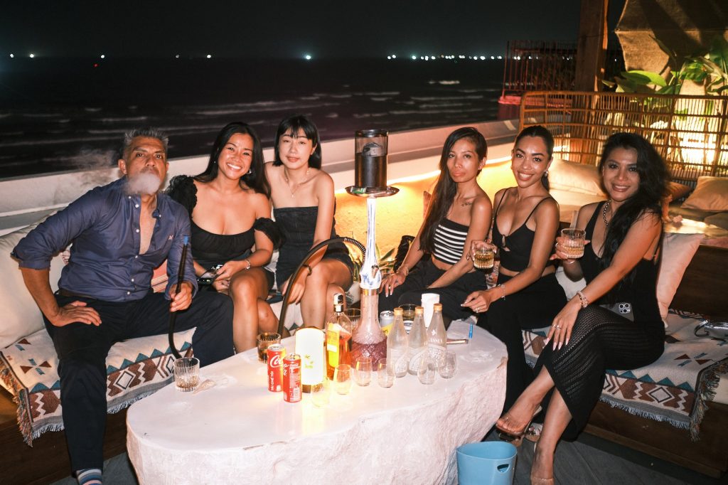 Customers enjoy at The Roof