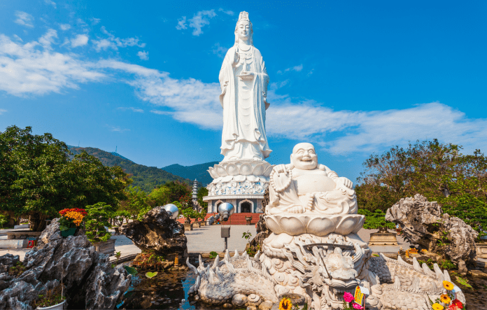 Linh Ung Pagoda on Son Tra Peninsula is a serene spiritual haven, renowned for its majestic Guan Yin statue (Buddha of Mercy). Towering at 67 meters, this stunning statue stands gracefully, offering blessings to all who visit. The pagoda's intricate architecture, surrounded by lush greenery and panoramic views of Da Nang's coastline, creates a peaceful atmosphere for reflection and meditation. Visitors can explore the beautifully landscaped grounds, adorned with colorful flowers and tranquil pathways, while taking in the breathtaking vistas of the sea and city below. Linh Ung Pagoda and its iconic Guan Yin statue embody a deep sense of spirituality and harmony, making it a must-visit destination for both pilgrims and tourists alike.