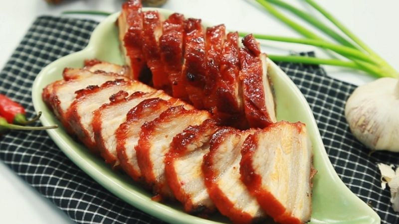 Thit xiu is a flavorful, tender Vietnamese dish made from marinated pork, typically seasoned with garlic, soy sauce, and five-spice powder. Slow-cooked to perfection, the meat is juicy with a slightly sweet and savory taste, making it a popular choice for banh mi or rice dishes.