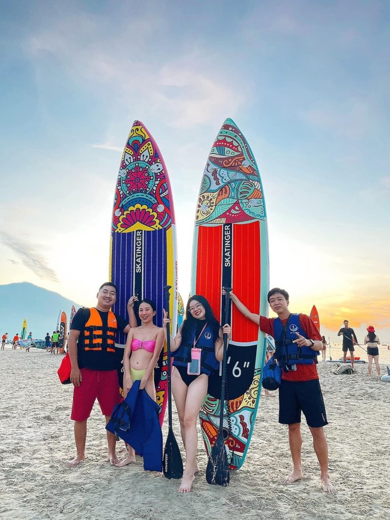Colorful SUPs stand out on Man Thai beach.